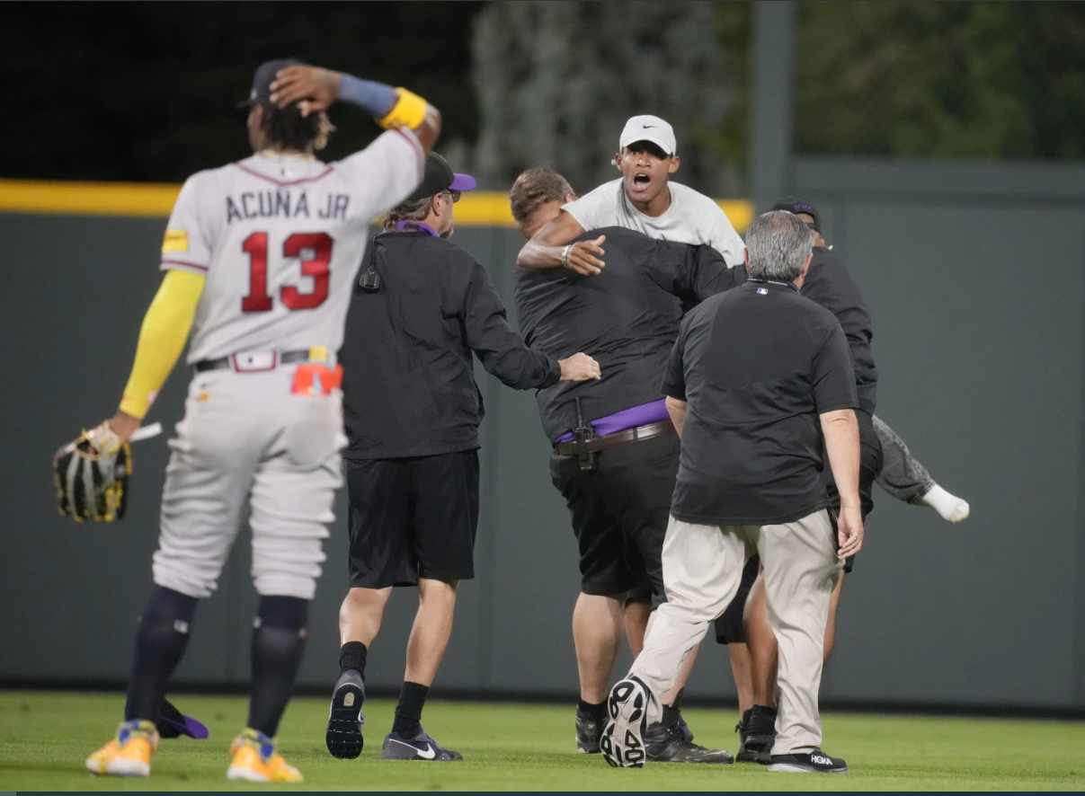 Ronald Acuña Jr. knocked over by fan charging field in Colorado, but Braves star says he’s OK